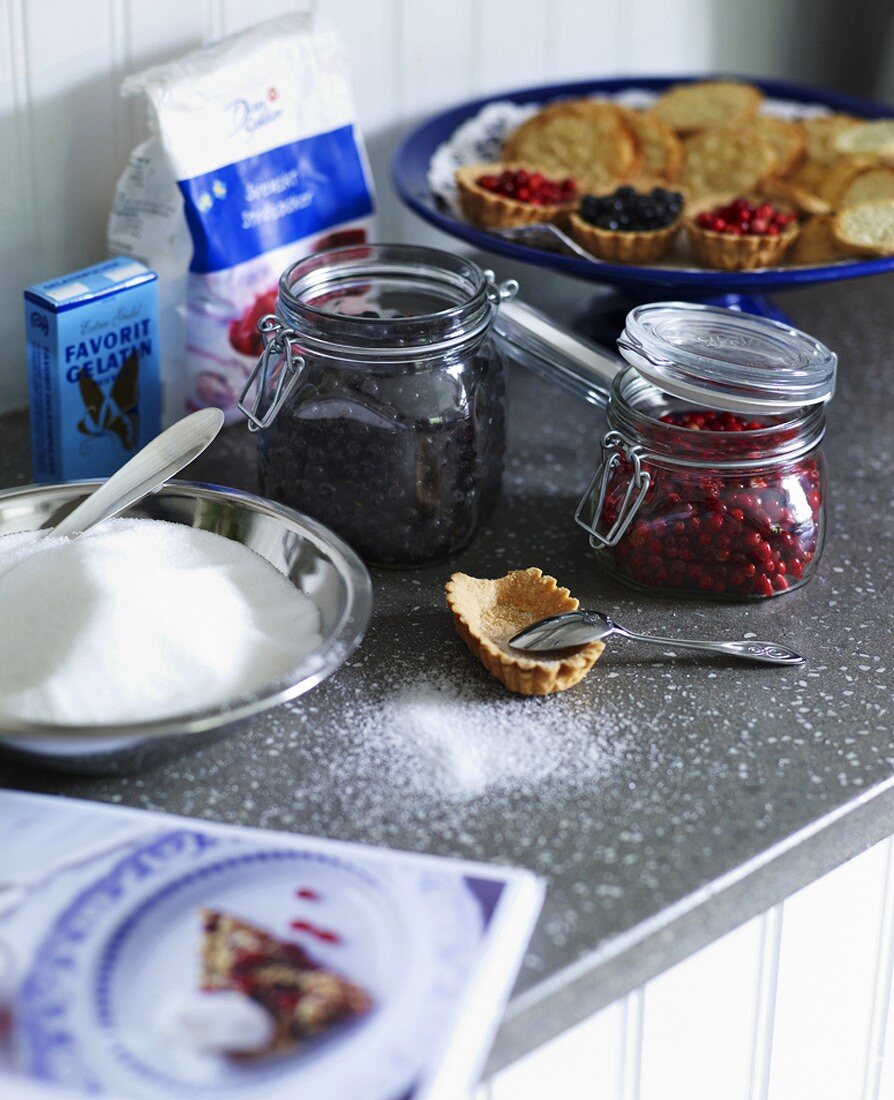 Blueberries, cranberries, baking ingredients and tartlets