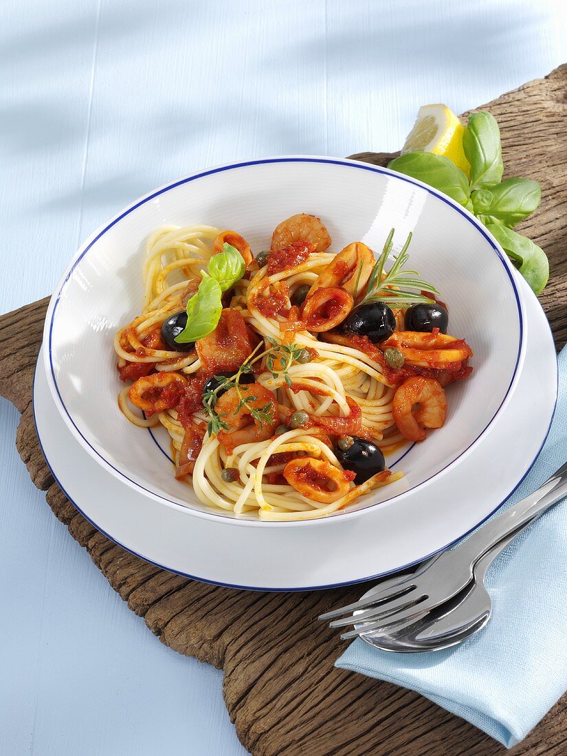 Spaghetti frutti di mare with olives