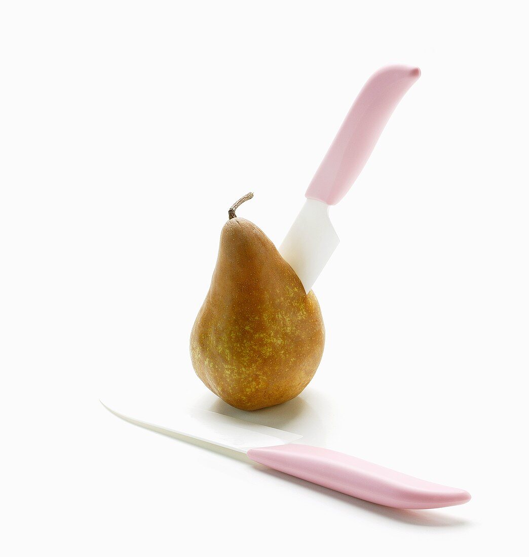 Two Pink Knives; One in a Pear