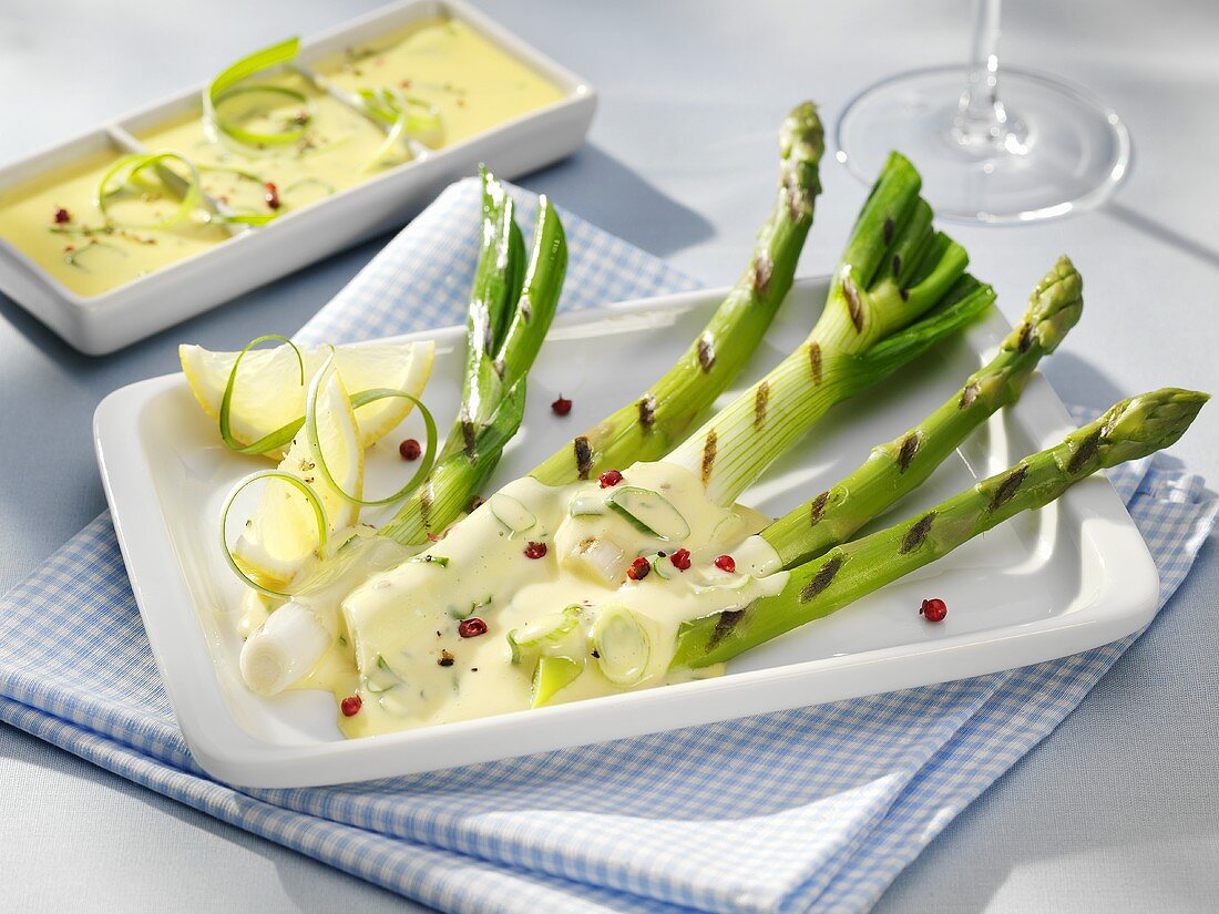 Grilled spring onions and asparagus with lemon butter sauce