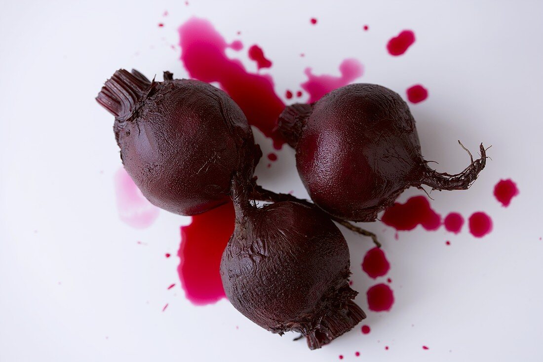 Three Whole Roasted Beets on White