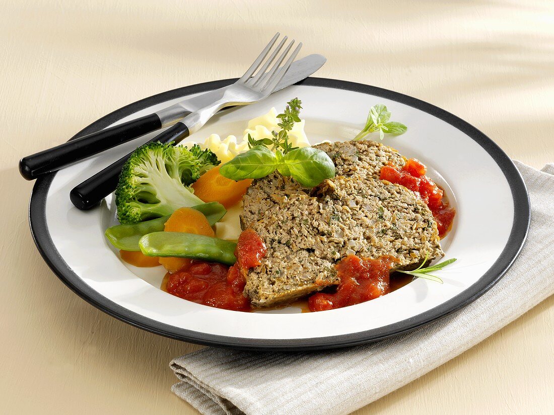 Meatloaf with vegetables and tomato sauce