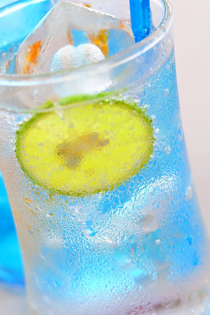 Soda water with lime on ice