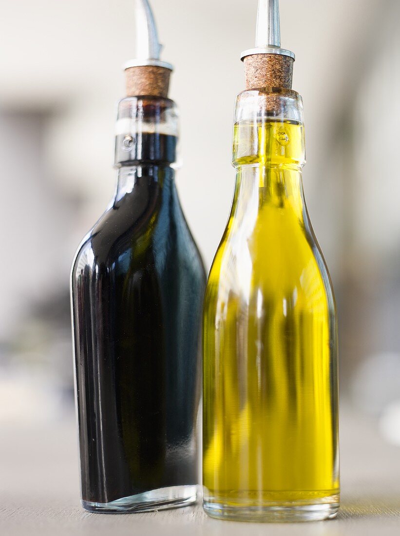Balsamic vinegar and olive oil in bottles