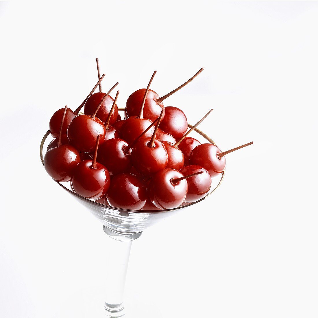 Candied cherries in stemmed glass