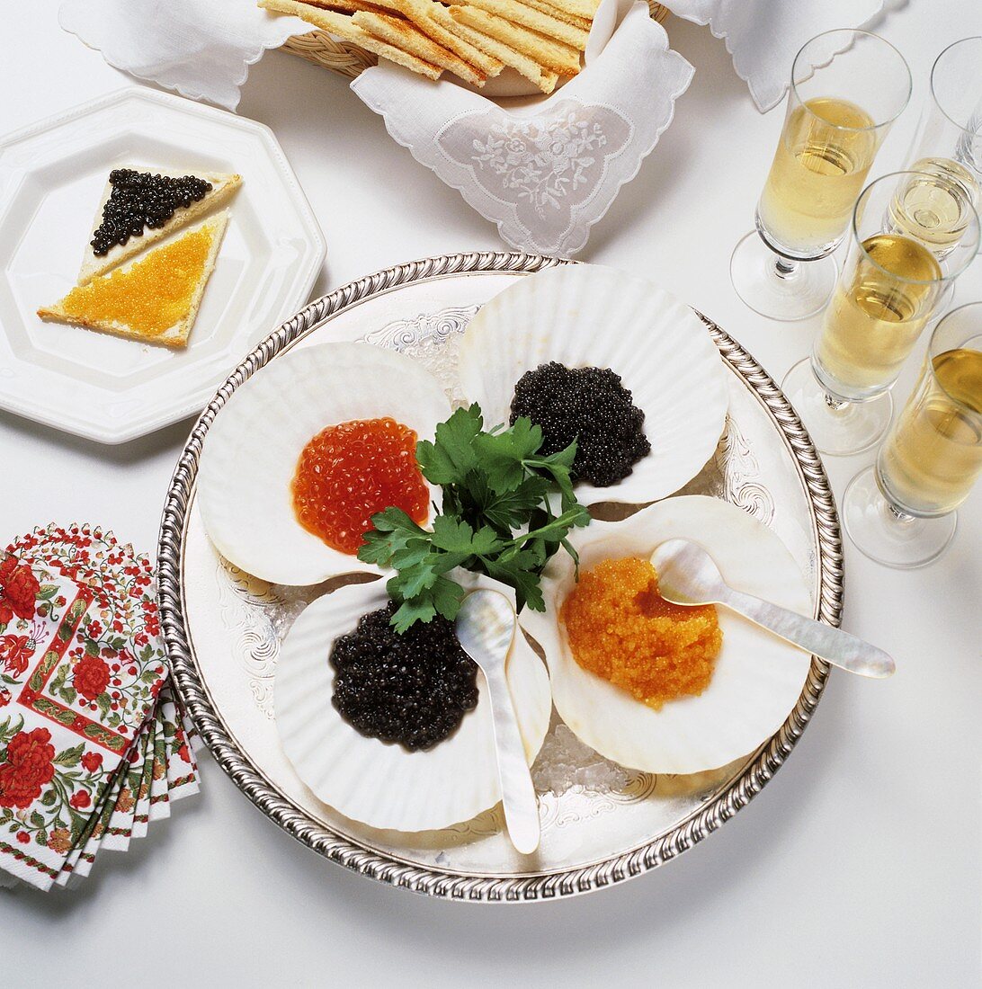Assorted Caviar on Ice with Crackers and Champagne 