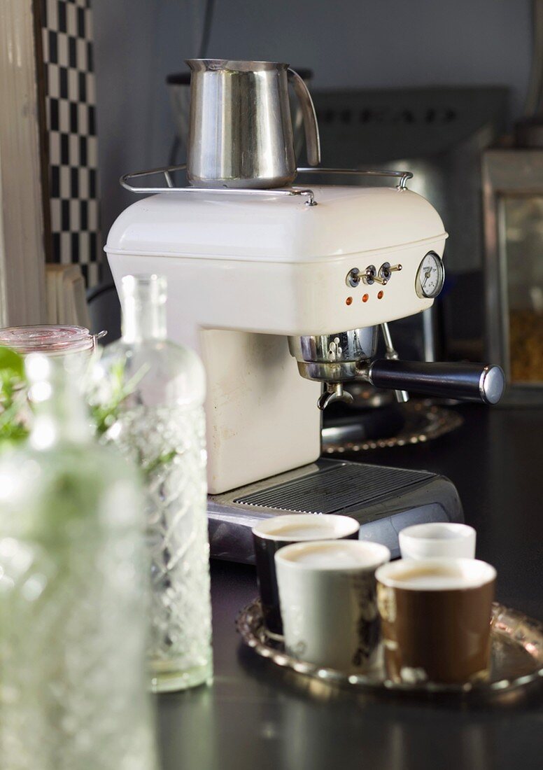 Espresso machine and several espresso cups
