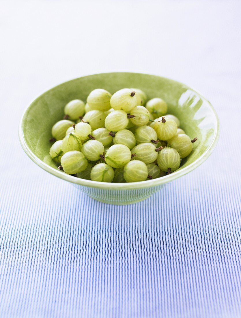 Gooseberries in green bowl