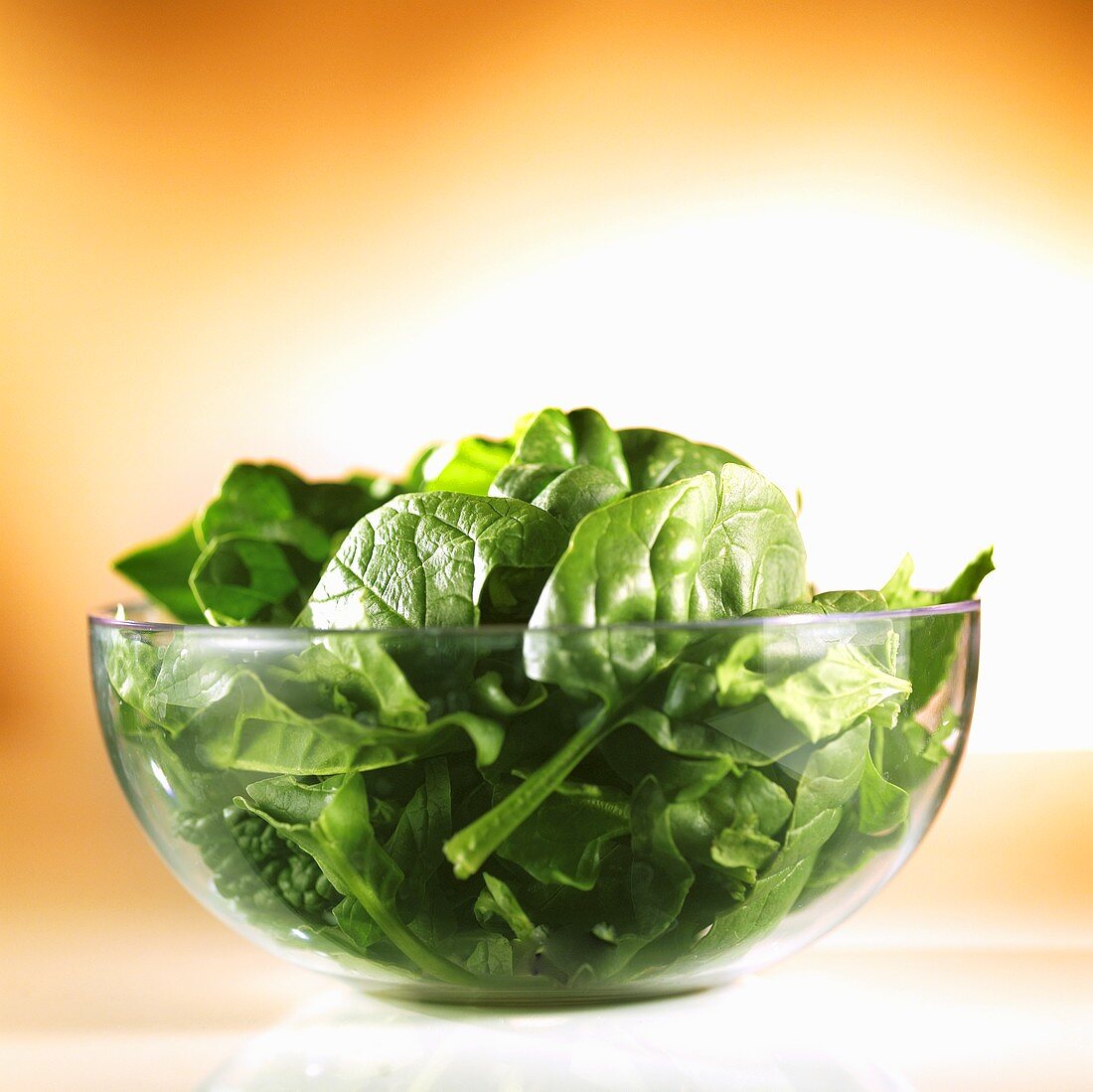 Spinach leaves in a glass bowl