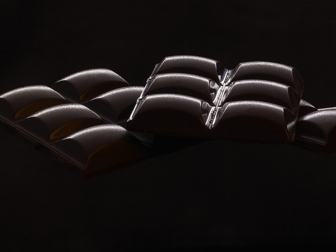 Bars of chocolate with black background