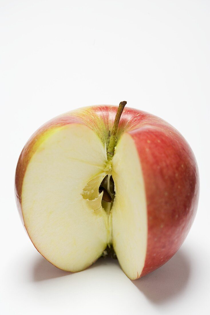An apple, variety 'Braeburn', with a wedge removed