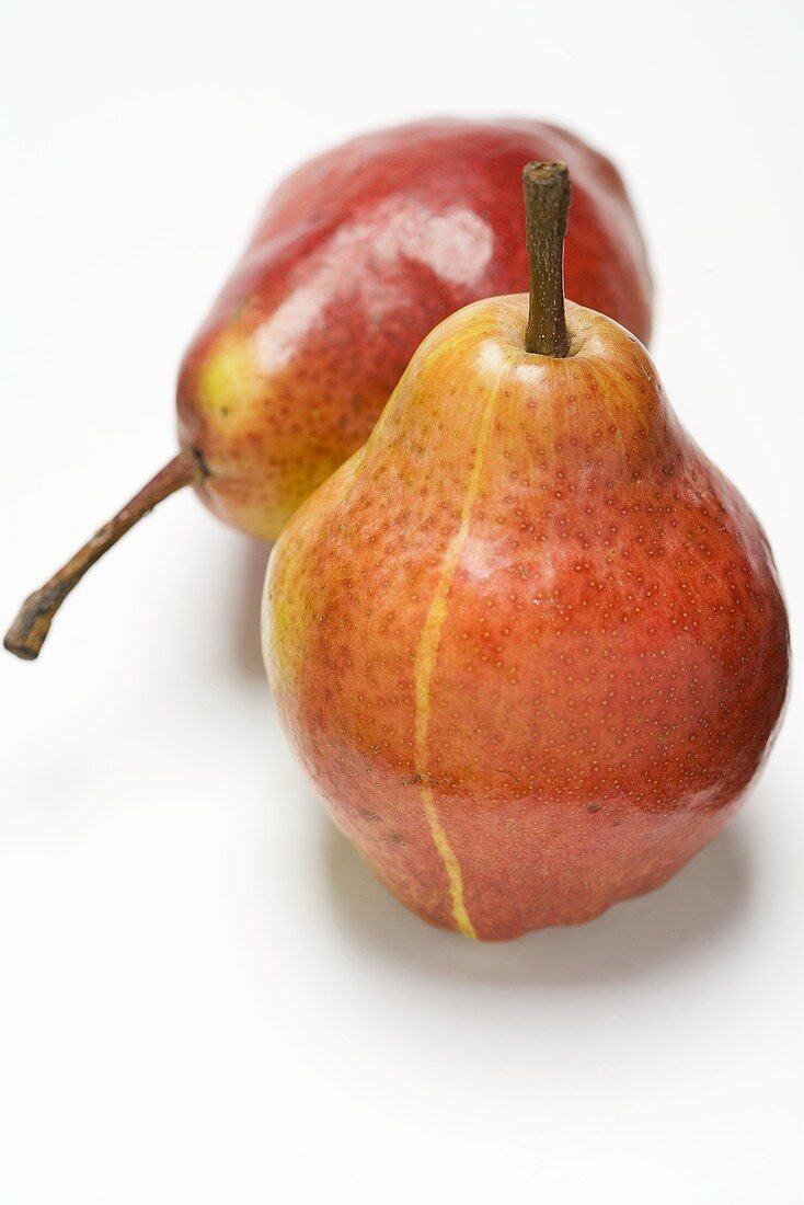 Two red Williams pears