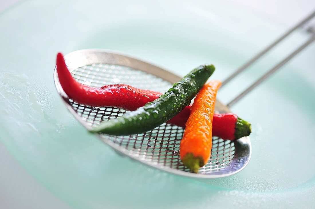 Mixed Thai chillies on a skimmer