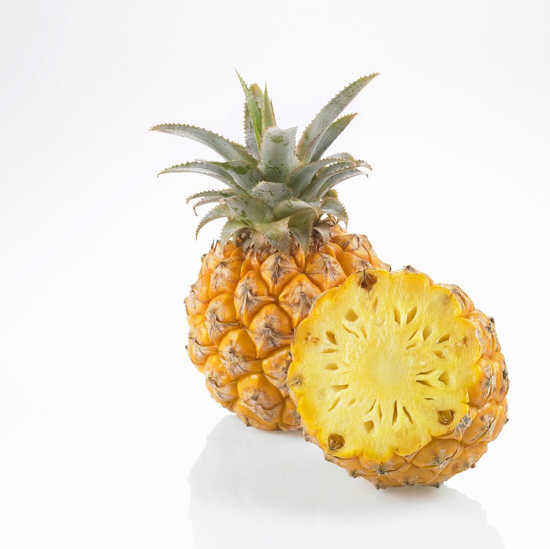 Baby pineapple, whole and a piece