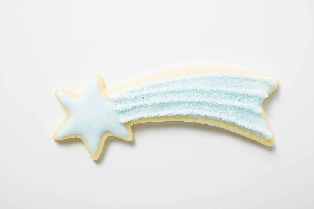 Shooting star biscuit with blue and white icing