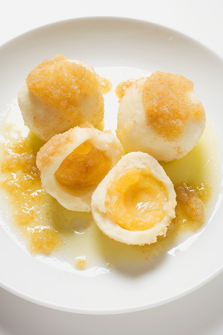 Apricot dumplings with buttered breadcrumbs