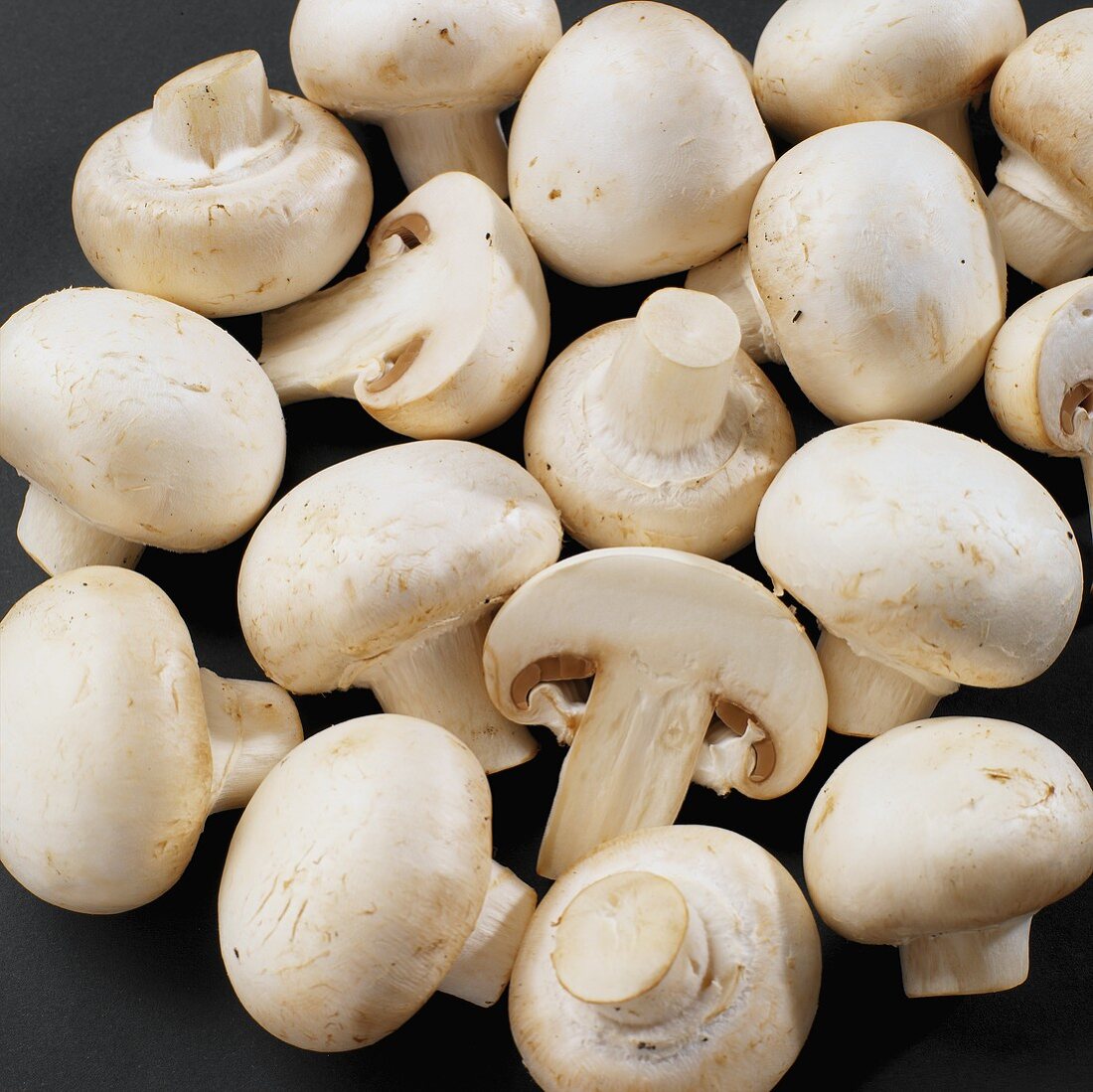 Fresh button mushrooms, whole and halved