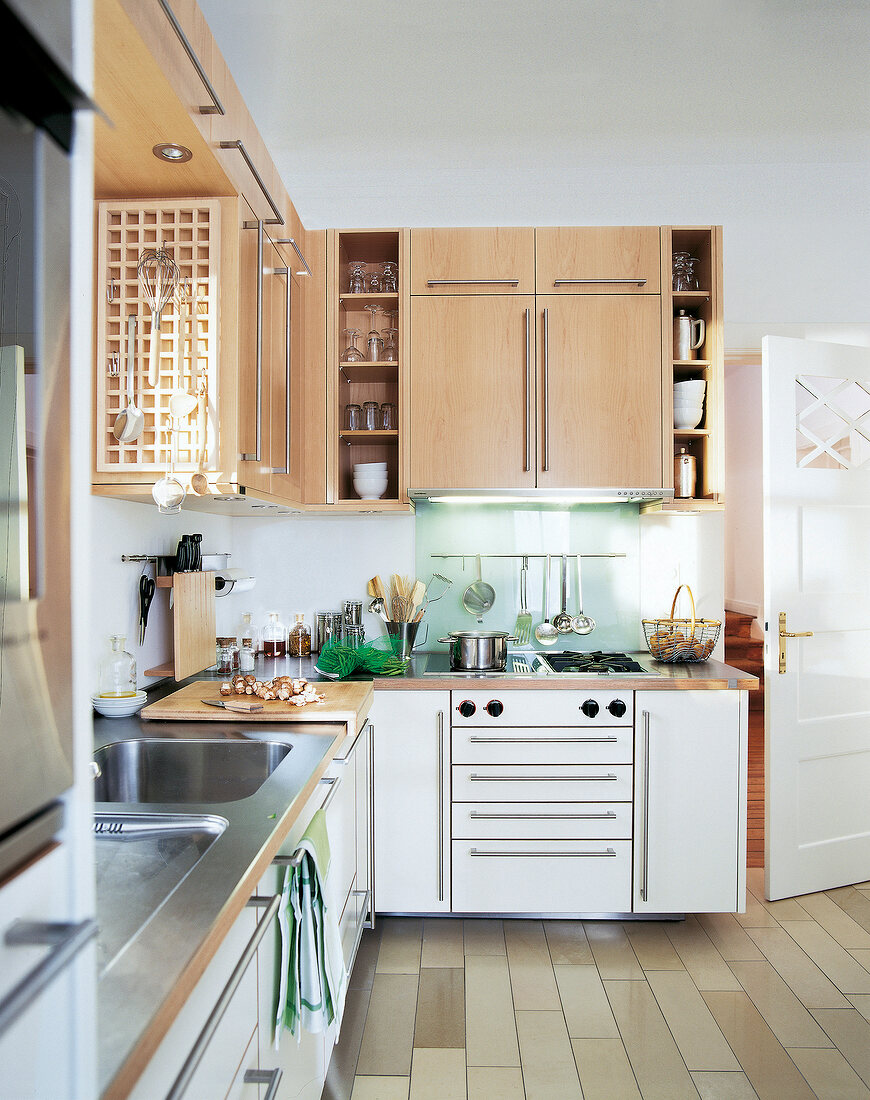 View of kitchen with maple wood cabinets