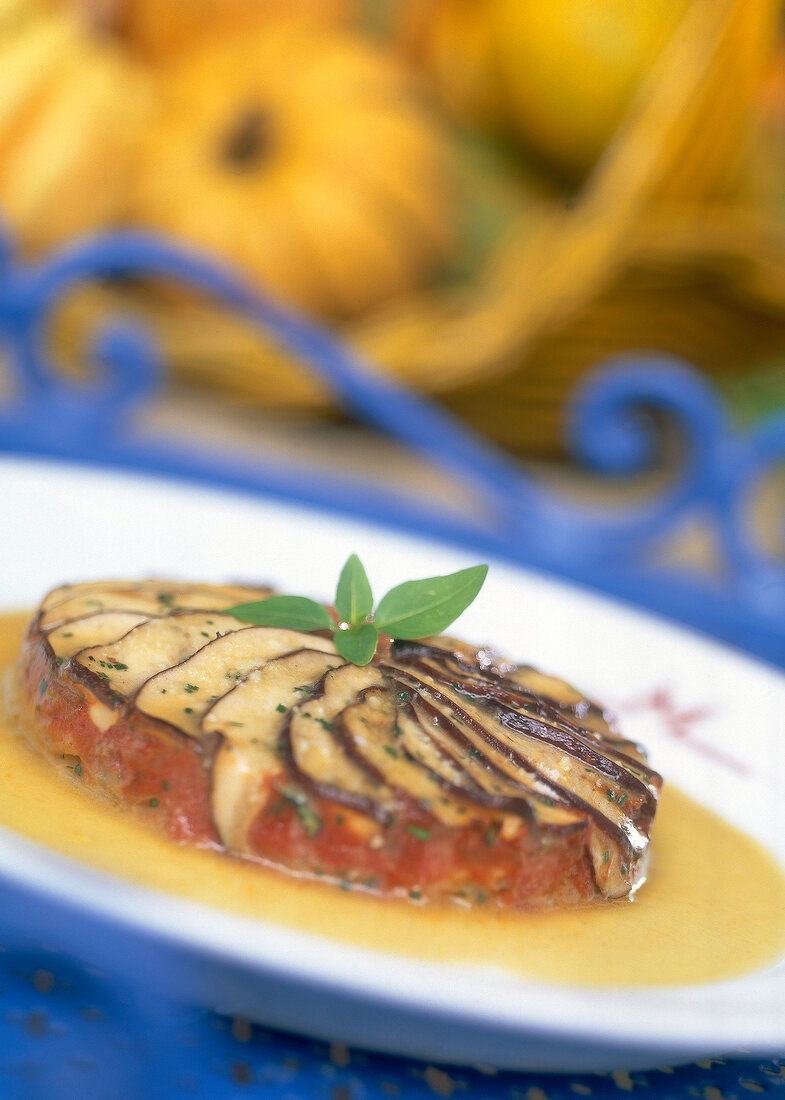 Close-up of mushroom tart on type of provence on plate