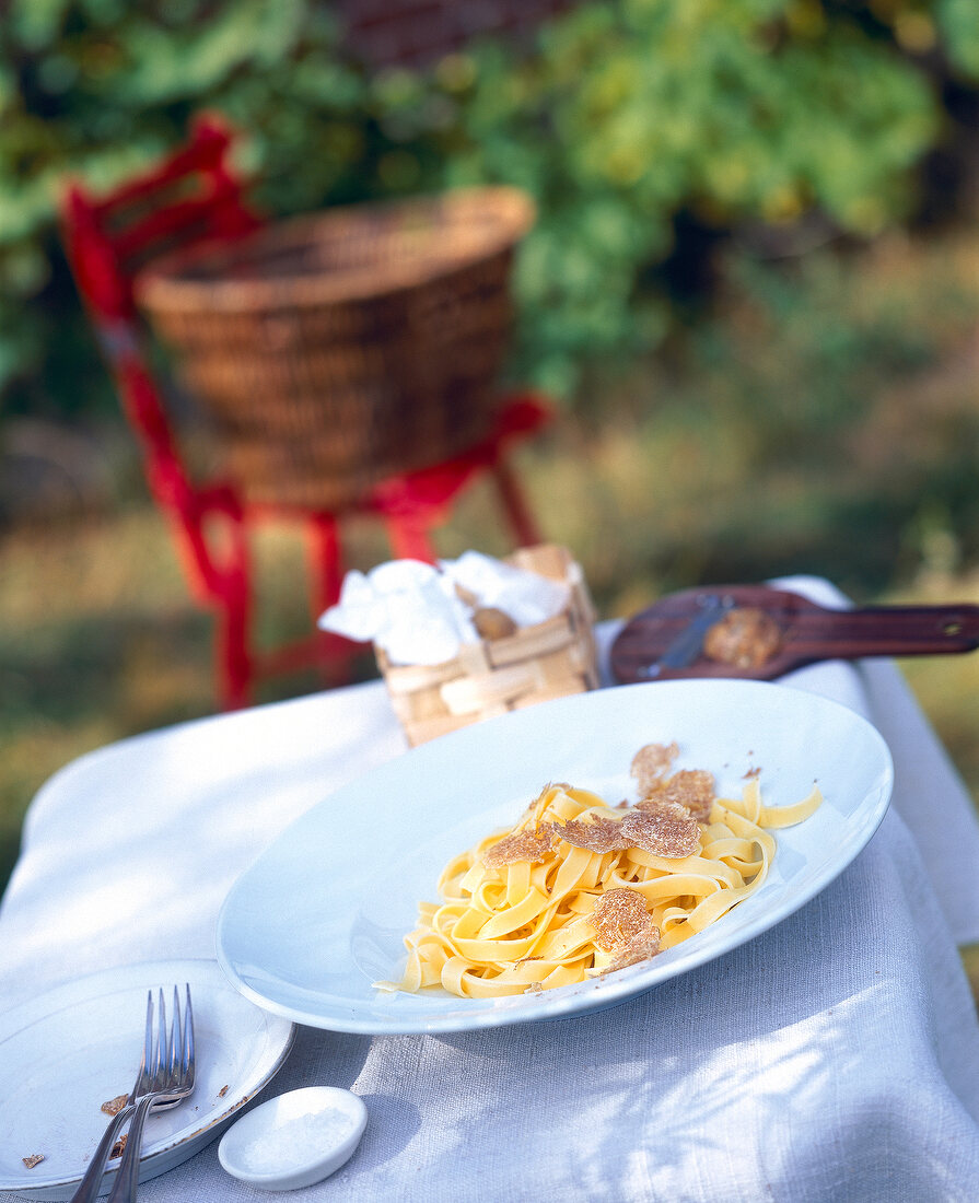 Tagliatelle with truffles on plate