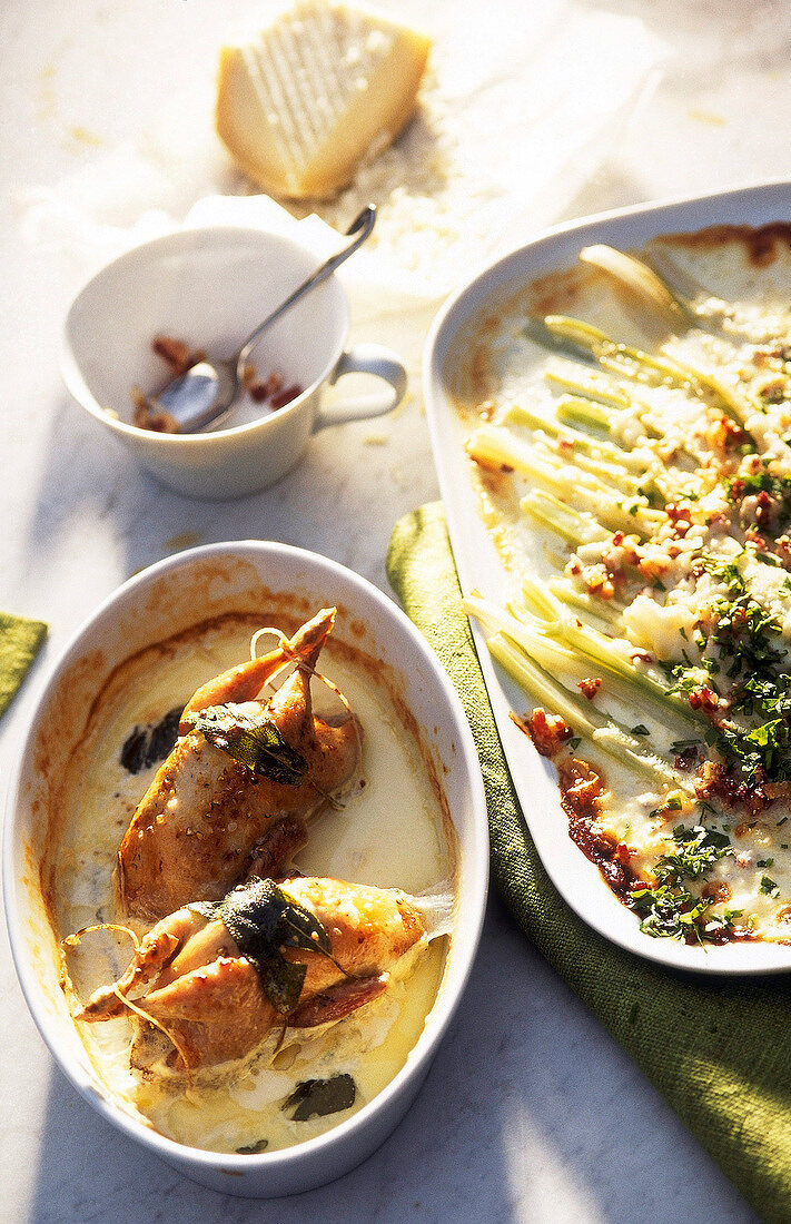 Quail with milk and sage and celery gratin in serving dishes