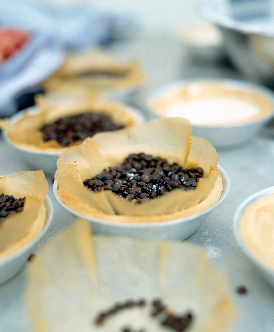 Close-up of lentils in bowl for preparation of sour cream tarts