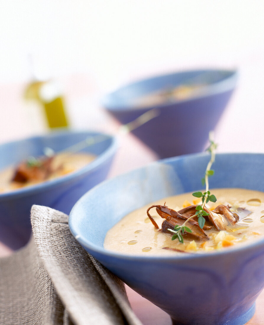 Porcini mushroom potato soup with truffle oil in bowl