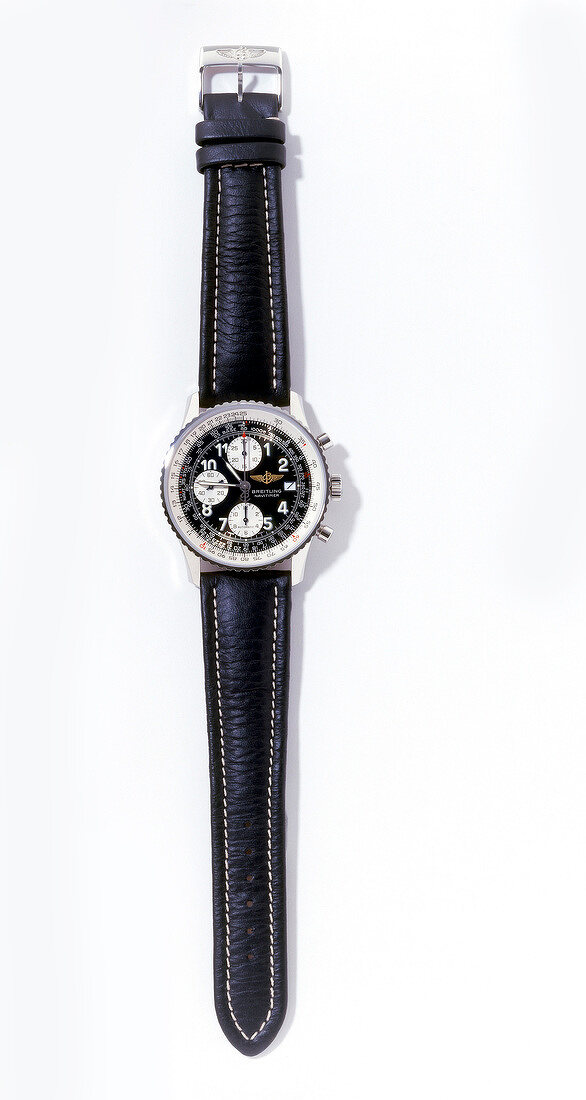 Close-up of wrist watch on white background