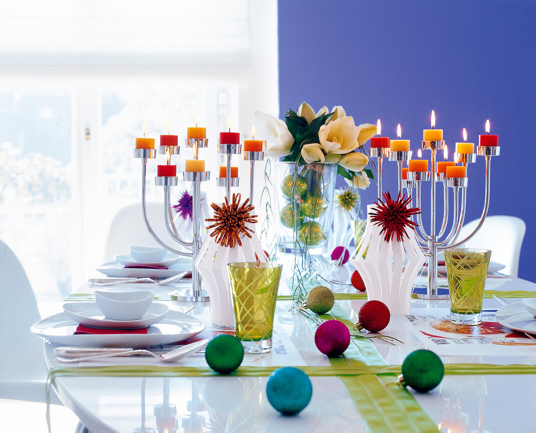 Table laid festively with ribbons and Christmas decorations