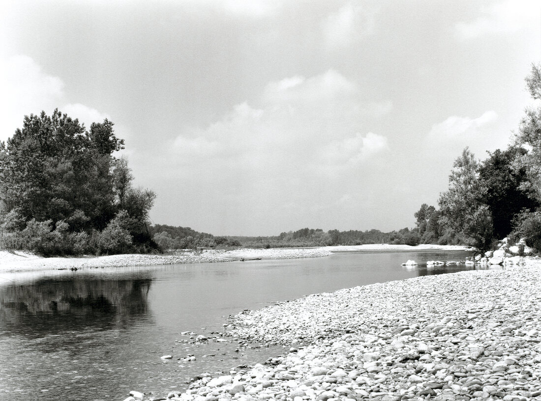 View of river with rocky shore