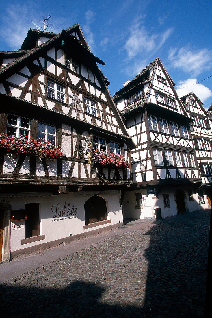 Half timbered houses in sunshine for tourists, Strasbourg, France