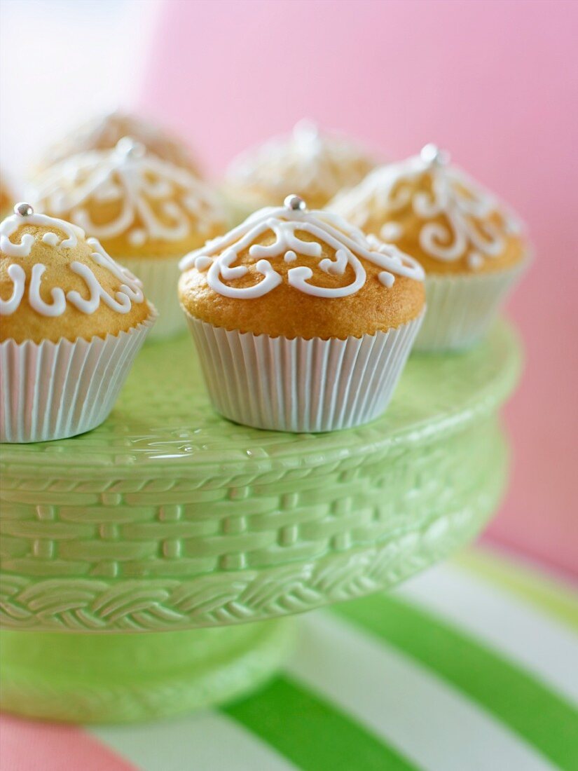 Lemon muffins decorated with silver pearls and icing sugar