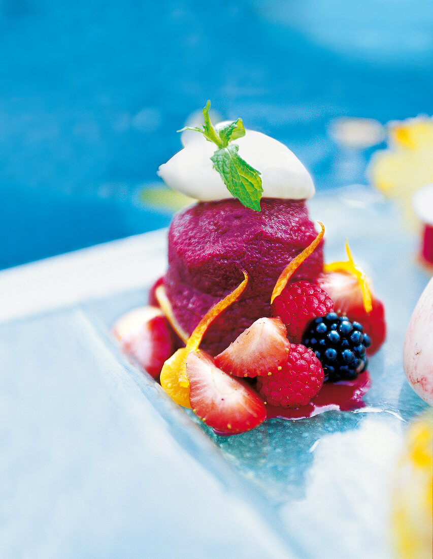 Ice cream with fruits on plate