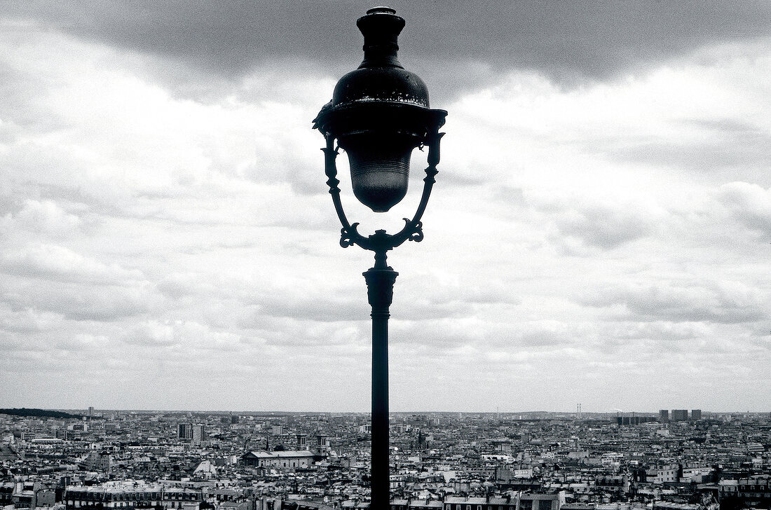 Close-up of lantern with clouds in background, Montmartre, Paris, France