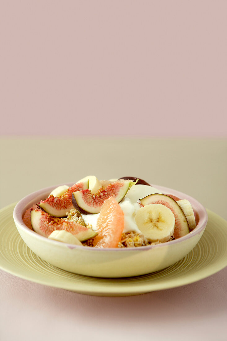 Fresh grain muesli with fruits in bowl
