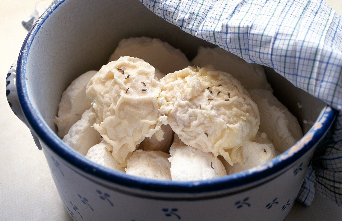 Hand made cheese in bucket