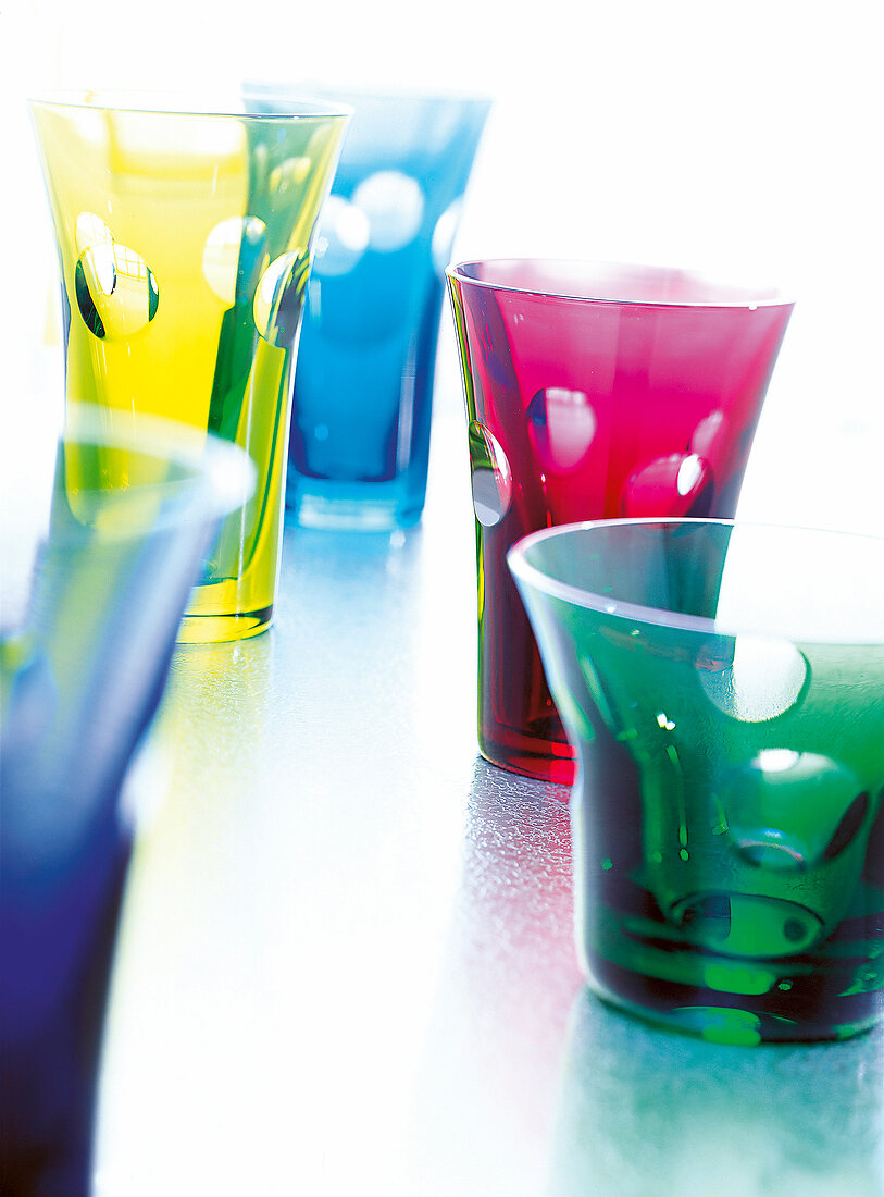 Colourful cup on surface