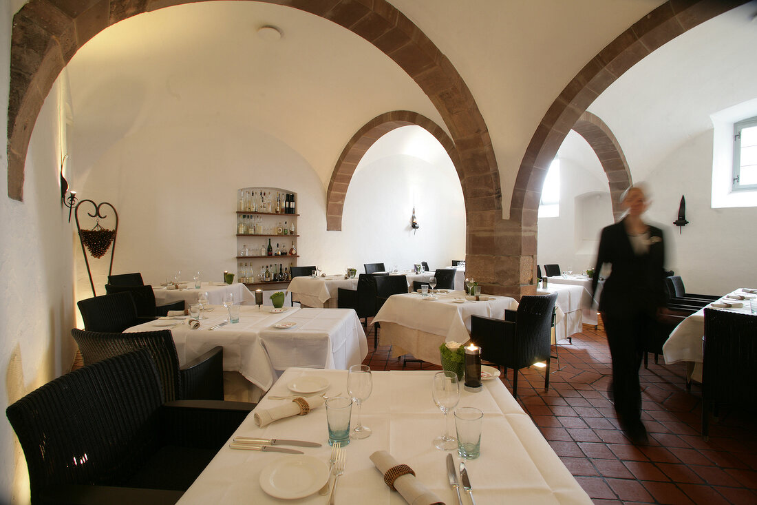 Tables laid in restaurant, Germany