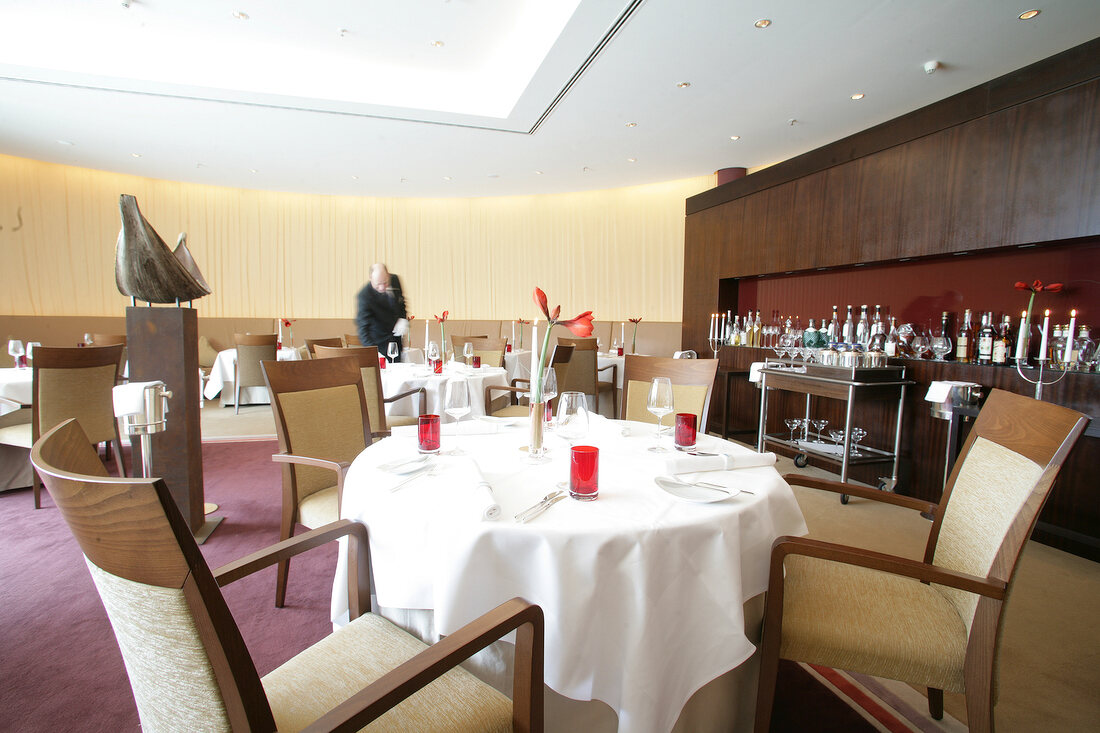 Laid tables and chairs in Le Ciel Restaurant at Hotel Intercontinental Resort in Germany