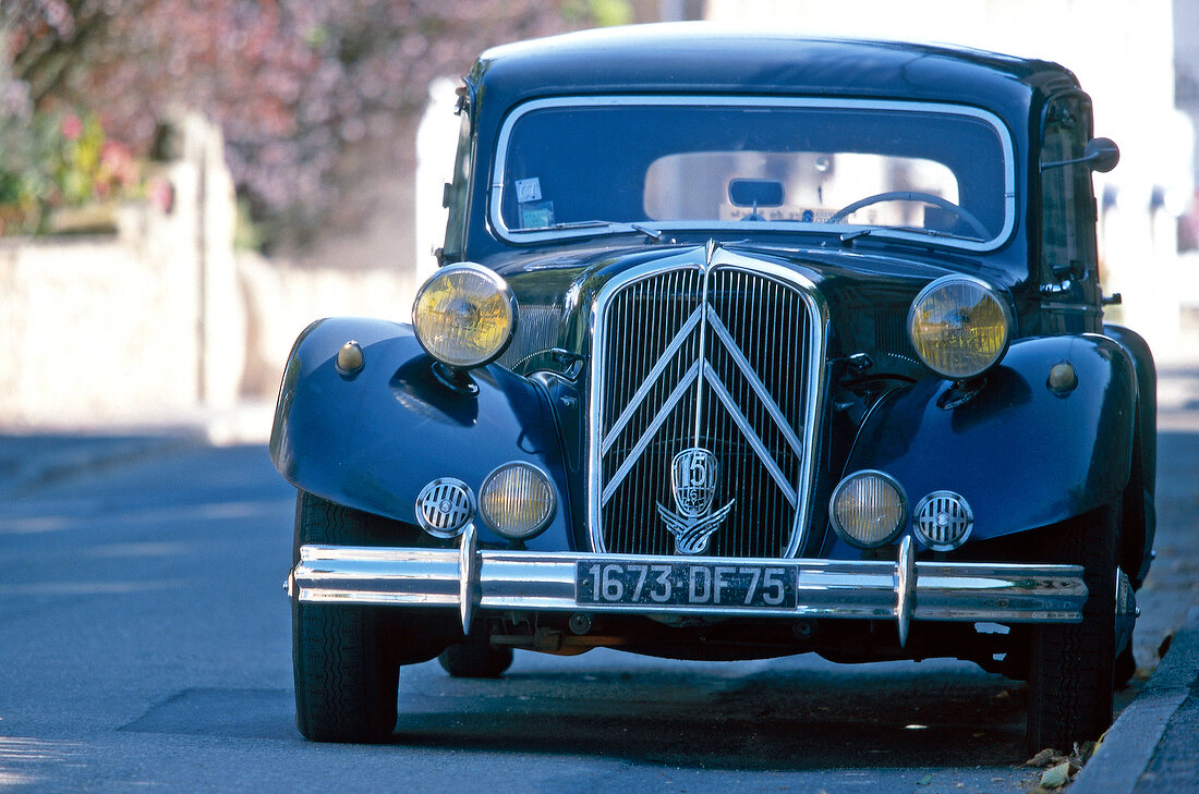 Oldtimer Traction Avant on road in Brittany, France