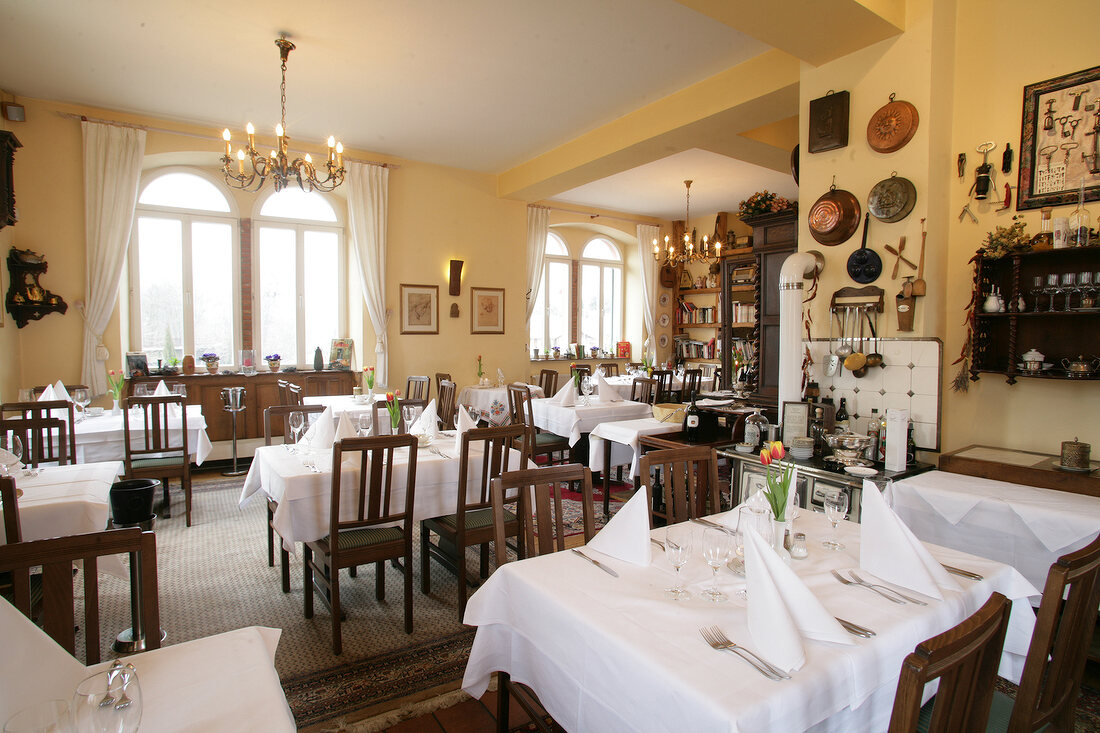 Interior of restaurant with laid tables in Germany