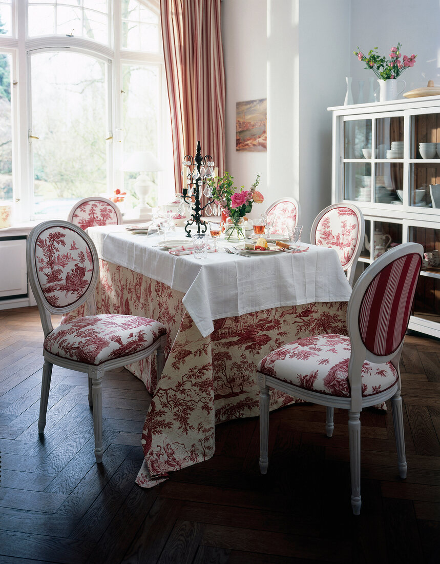 Dining table with toile de jouy patterns with tablecloth