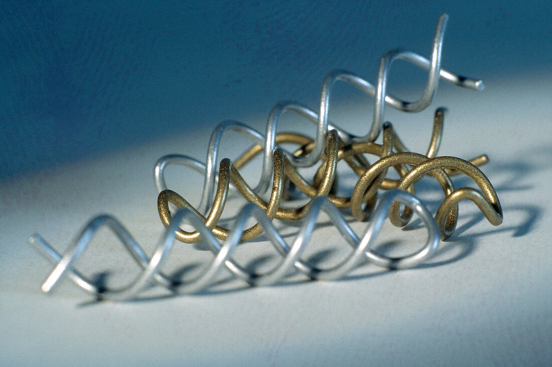 Close-up of different hair spirals on white background