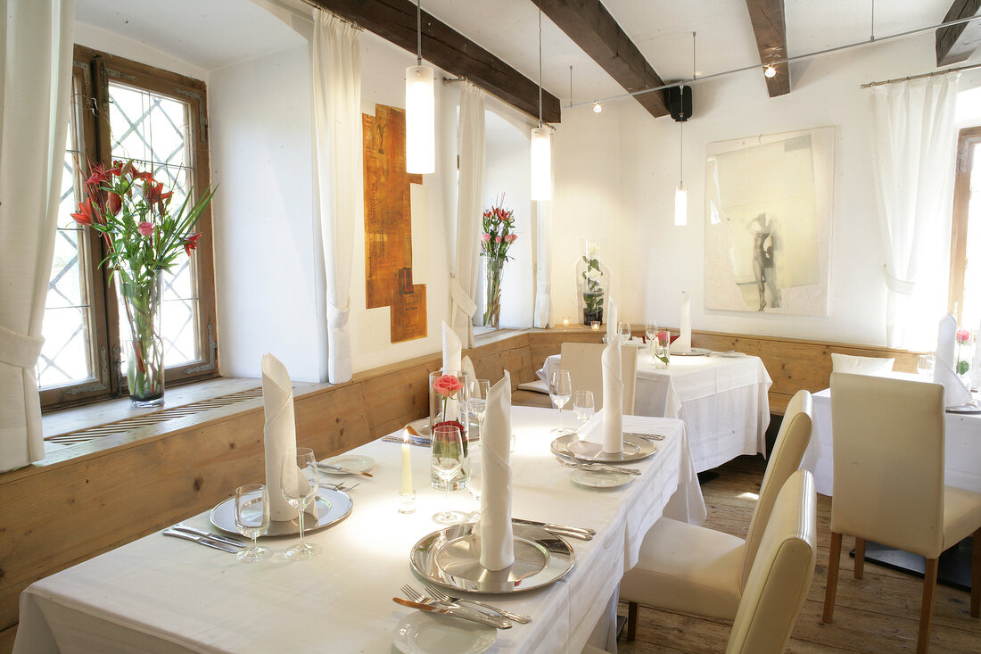 Tables laid in restaurant, Austria