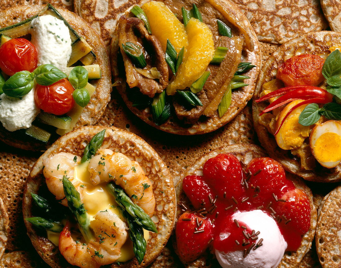 Close-up of various Russian blinis