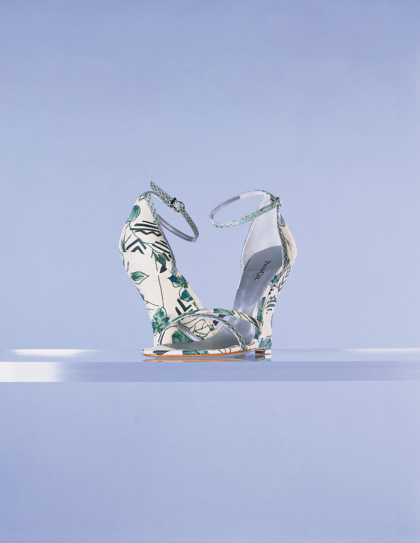 Sandal with wedge heel and floral pattern print on glass shelf