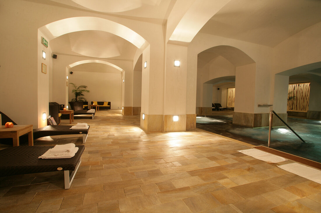 Swimming pool and loungers in Boscolo carlo IV Hotel in Prague, Czech Republic, Germany