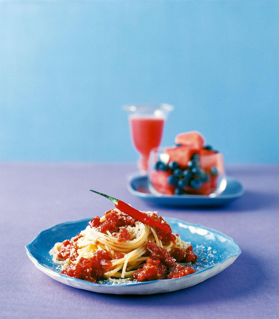 Spaghetti with tomato and chilli sauce on plate