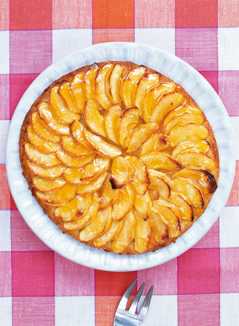 Normadian apple pie on check table cloth