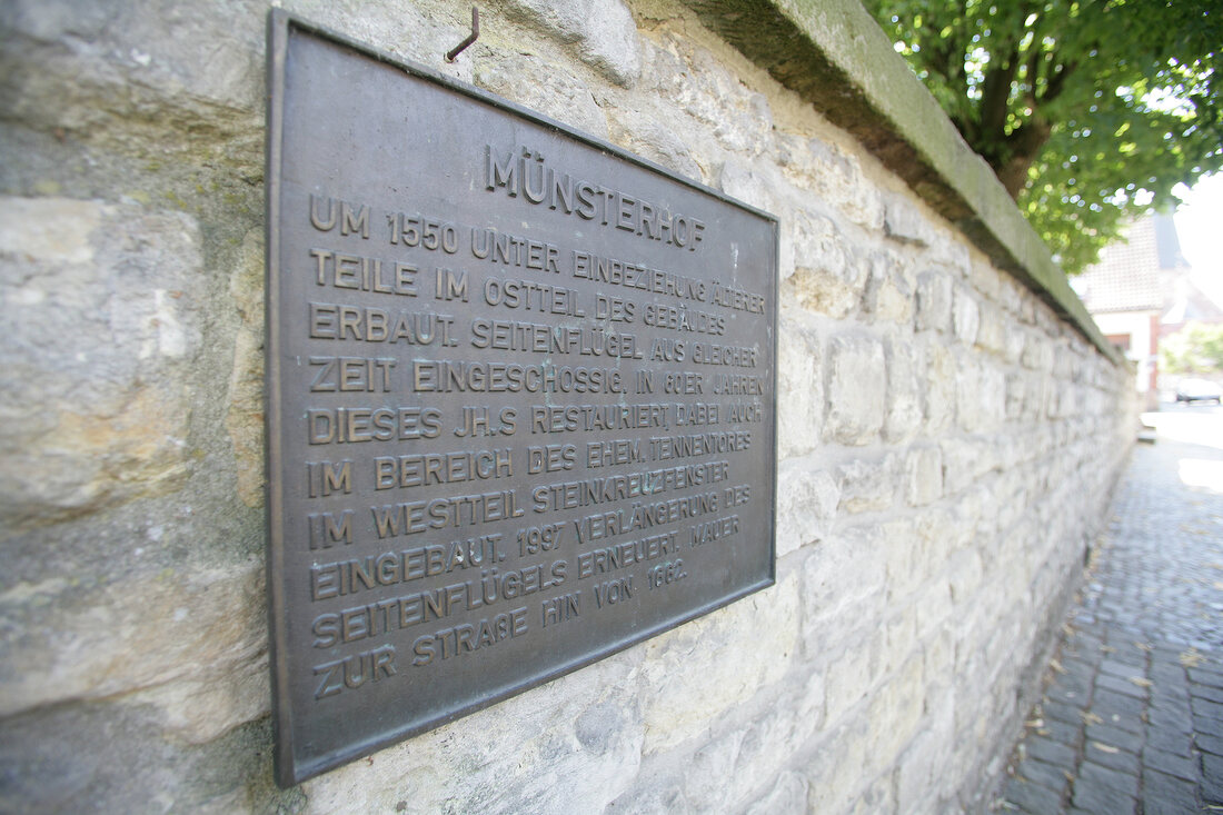 Close-up of information board on wall